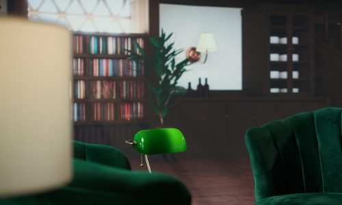 Inviting therapy space with plush green chairs and wooden bookshelves, soothing lighting. Professional comfortable environment for counselors, psychologists or therapy sessions.